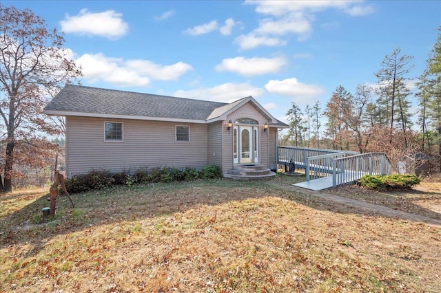 W7604 Sleepy Eye Rd, Minong, WI 54859 - ranch-style house with a shingled roof and a front yard
