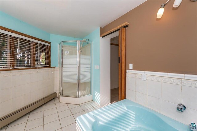 2608 Logan Ave, Superior, WI 54880 - full bathroom featuring a baseboard heating unit, tile patterned floors, a stall shower, tile walls, and a garden tub