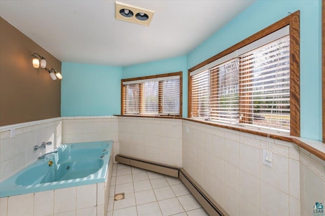 2608 Logan Ave, Superior, WI 54880 - full bathroom with a garden tub, tile patterned floors, baseboard heating, and wainscoting