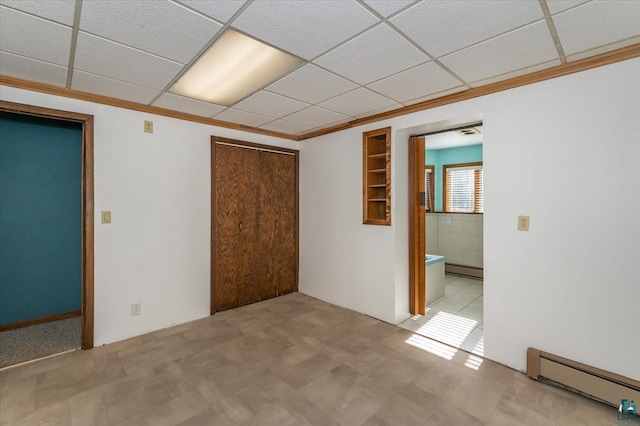 2608 Logan Ave, Superior, WI 54880 - spare room with a baseboard radiator, a paneled ceiling, and ornamental molding