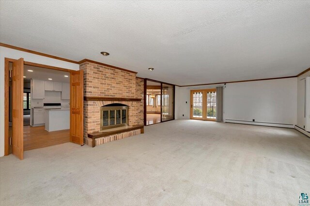 2608 Logan Ave, Superior, WI 54880 - unfurnished living room featuring light carpet, a textured ceiling, recessed lighting, a brick fireplace, and ornamental molding