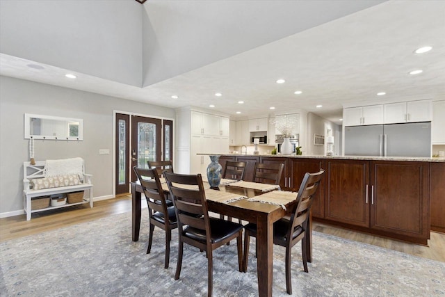 4441 N John Paul Rd, Milton, WI 53546 - dining area featuring baseboards, light wood-type flooring, and recessed lighting