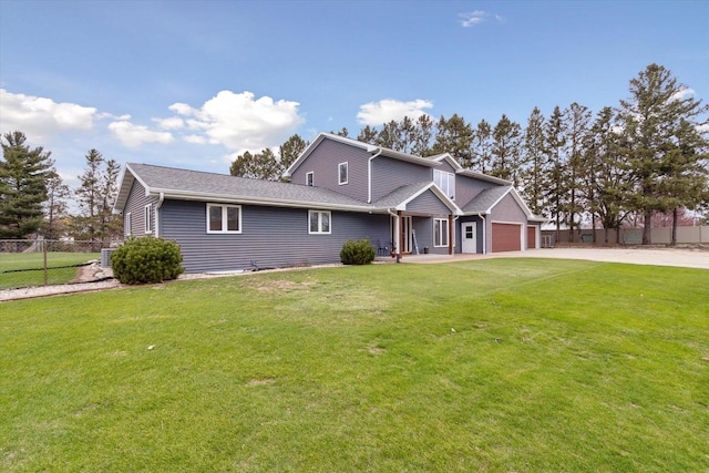 4441 N John Paul Rd, Milton, WI 53546 - traditional-style home with a front lawn, driveway, an attached garage, and fence