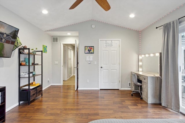 4441 N John Paul Rd, Milton, WI 53546 - home office with vaulted ceiling, dark wood-style flooring, baseboards, visible vents, and a ceiling fan