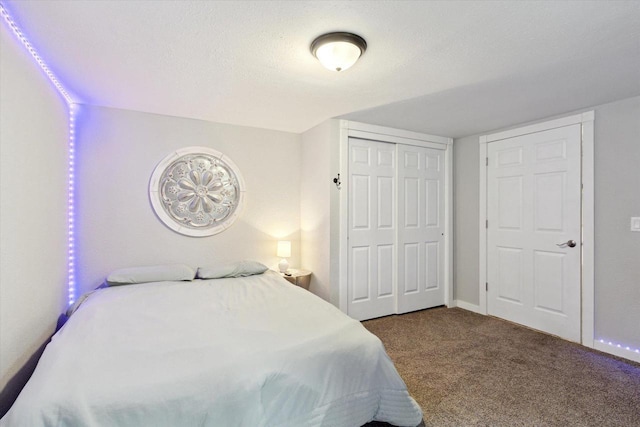 4441 N John Paul Rd, Milton, WI 53546 - bedroom with a closet, carpet floors, and baseboards