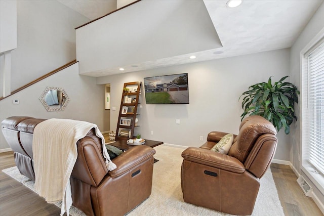 4441 N John Paul Rd, Milton, WI 53546 - living room featuring recessed lighting, light wood finished floors, a healthy amount of sunlight, and baseboards