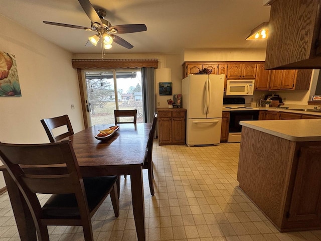 dining space featuring ceiling fan