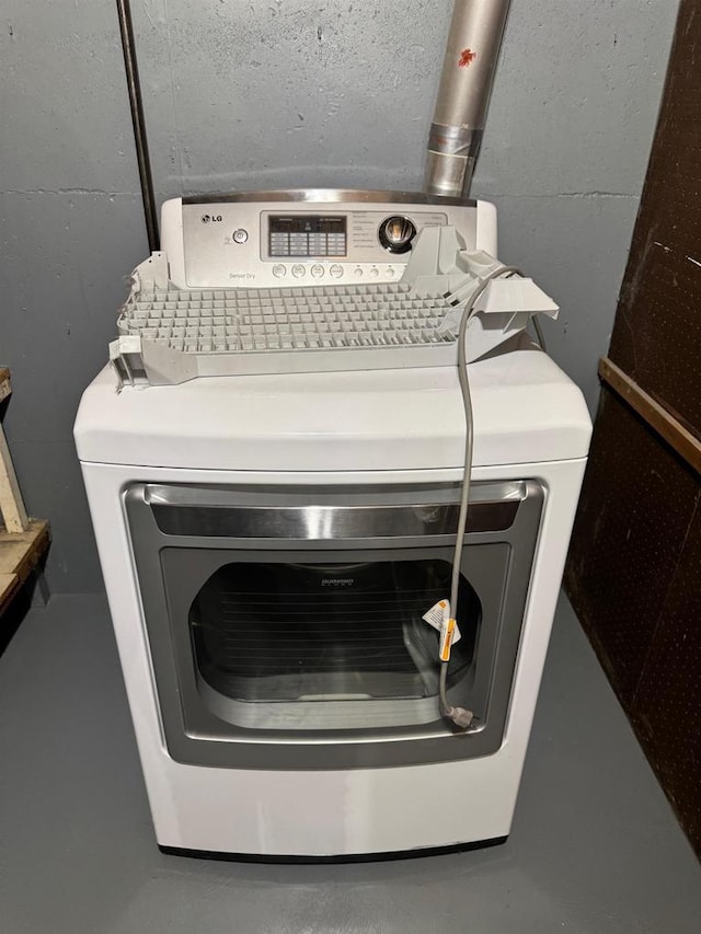 laundry area featuring laundry area and washer / clothes dryer
