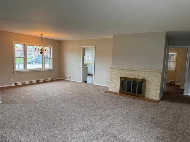 unfurnished living room with carpet flooring, baseboards, visible vents, a notable chandelier, and a baseboard radiator