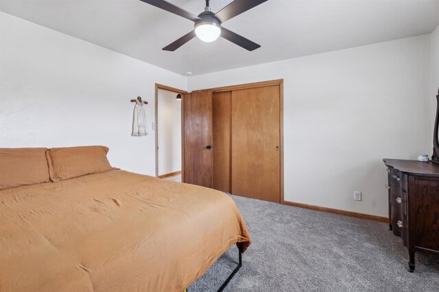 W5184 Shady Ln, Shawano, WI 54166 - bedroom with baseboards, carpet flooring, a closet, and ceiling fan
