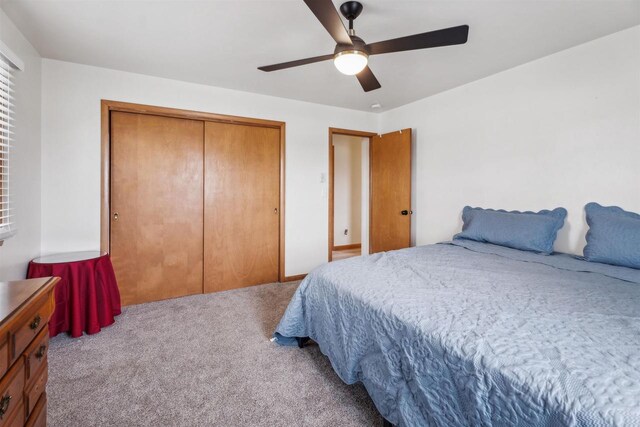 W5184 Shady Ln, Shawano, WI 54166 - bedroom featuring a ceiling fan, carpet flooring, and a closet