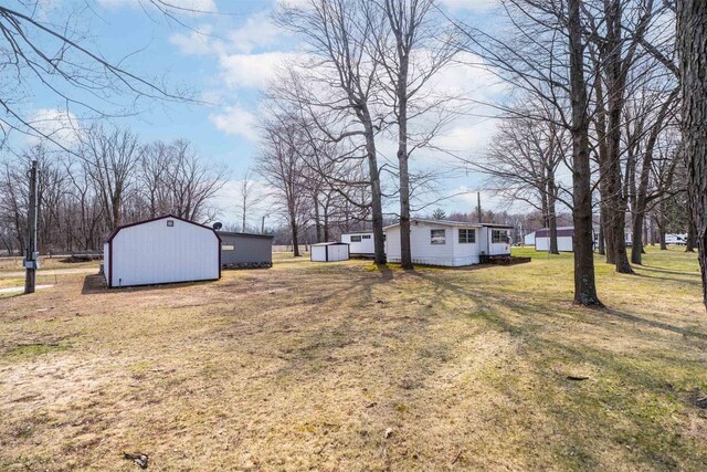 W5184 Shady Ln, Shawano, WI 54166 - view of yard with an outbuilding and a shed