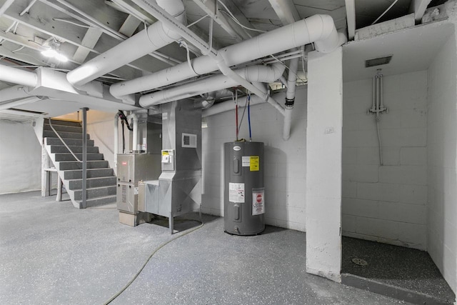 N5599 Mill St, Shiocton, WI 54170 - unfinished basement with water heater, heating unit, visible vents, and stairs