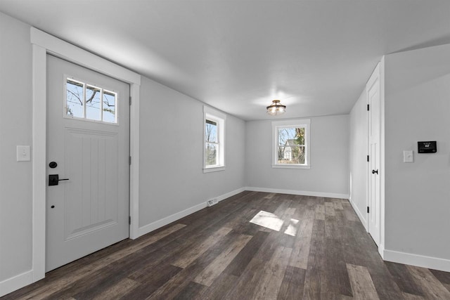 N5599 Mill St, Shiocton, WI 54170 - foyer with baseboards and dark wood-style floors