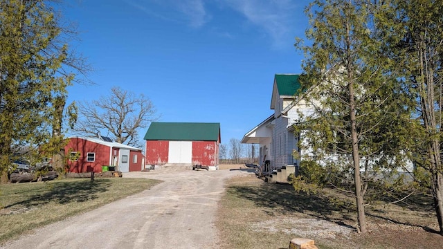 N2226 State Road 57, New Holstein, WI 53061 - view of street with dirt driveway