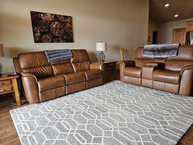 living room with recessed lighting and wood finished floors