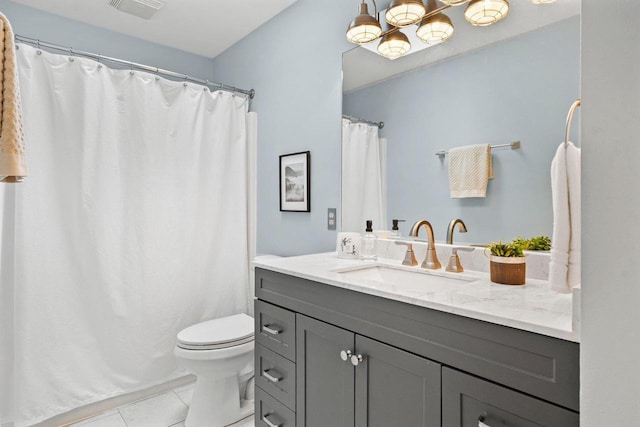 W9517 Parkway Dr, Poynette, WI 53955 - full bathroom with tile patterned flooring, toilet, vanity, visible vents, and a notable chandelier