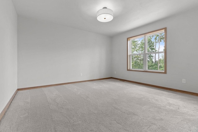 3216 Eclipse Dr, Green Bay, WI 54311 - carpeted empty room featuring baseboards
