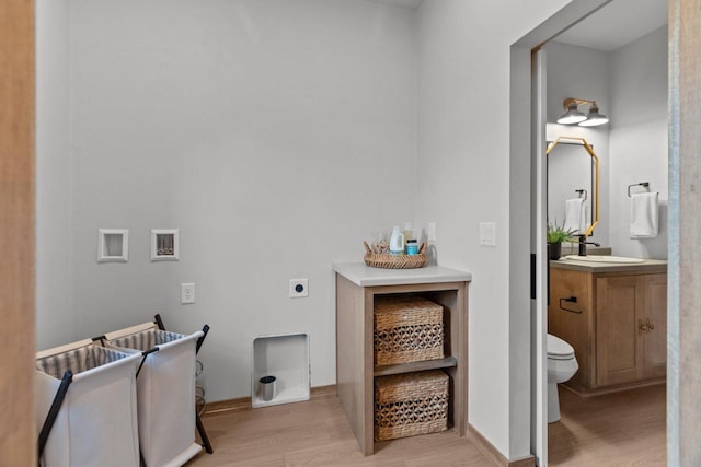 3216 Eclipse Dr, Green Bay, WI 54311 - laundry area with light wood-style flooring and hookup for an electric dryer