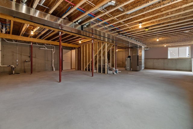 3216 Eclipse Dr, Green Bay, WI 54311 - basement featuring electric water heater and heating unit