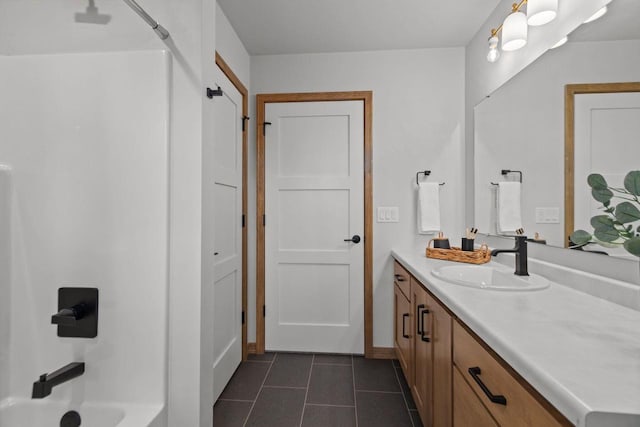 3216 Eclipse Dr, Green Bay, WI 54311 - full bath featuring vanity, tile patterned floors, and bathtub / shower combination