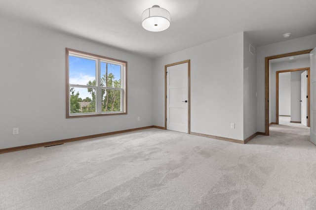 3216 Eclipse Dr, Green Bay, WI 54311 - unfurnished room featuring light colored carpet and a smoke detector