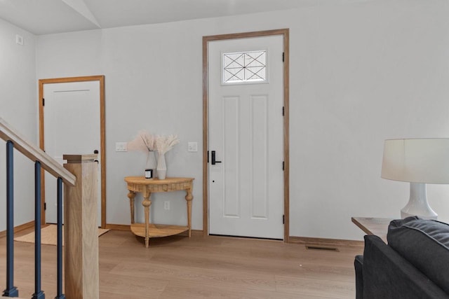 3216 Eclipse Dr, Green Bay, WI 54311 - foyer entrance featuring light wood-style floors and stairway