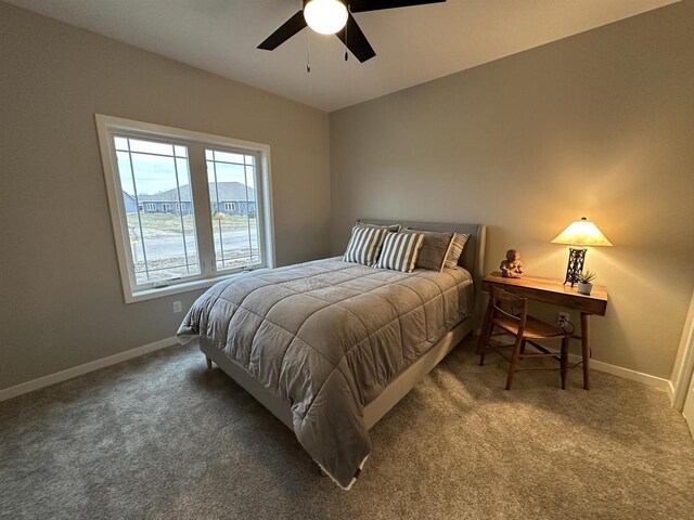 3131 S Bartells Dr, Beloit, WI 53511 - bedroom featuring carpet flooring, baseboards, and a ceiling fan