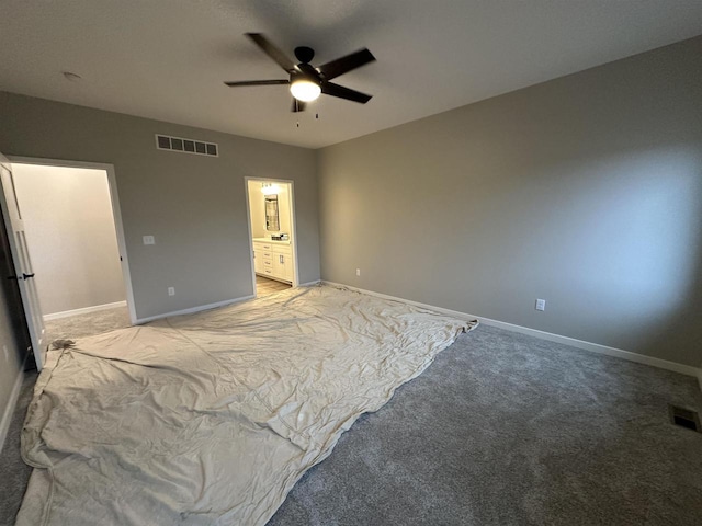 3131 S Bartells Dr, Beloit, WI 53511 - unfurnished bedroom with light carpet, visible vents, and baseboards