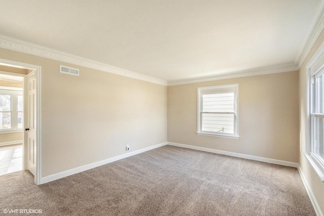4858 N 73rd St, Milwaukee, WI 53218 - carpeted spare room with visible vents, crown molding, and a healthy amount of sunlight