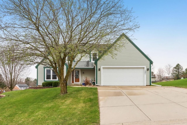 traditional-style home with a front lawn, driveway, and a garage