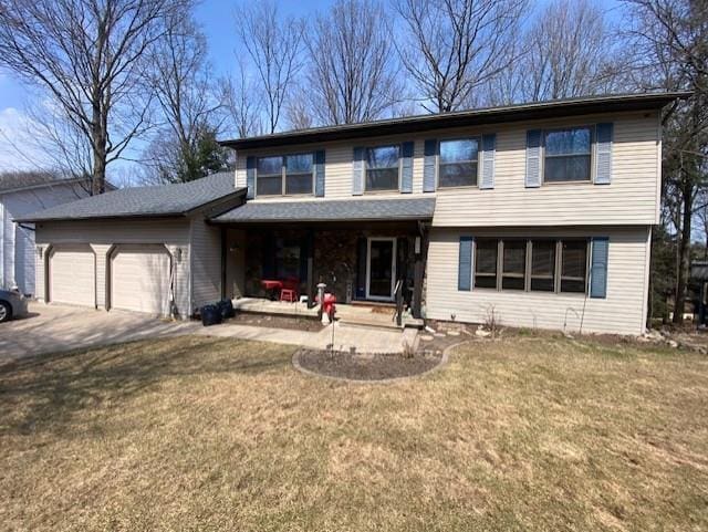 traditional home with concrete driveway, a front lawn, a porch, and a garage