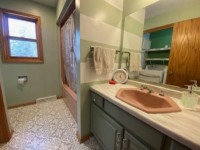 bathroom with visible vents, tile patterned flooring, vanity, toilet, and baseboards