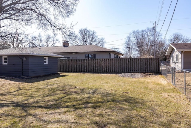 view of yard featuring a fenced backyard