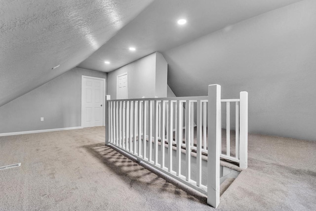 6824 W Hayes Ave, West Allis, WI 53219 - bonus room with vaulted ceiling, visible vents, carpet, and recessed lighting