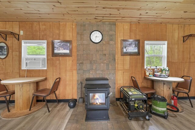 W13670 Brooks Ln, Crivitz, WI 54114 - interior space featuring wood ceiling, wood finished floors, wood walls, and a wood stove
