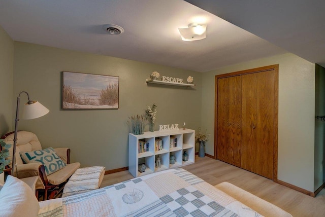 504 Lake St, Mount Horeb, WI 53572 - bedroom featuring wood finished floors, baseboards, and a closet