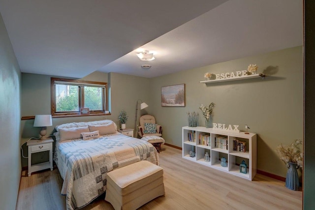 504 Lake St, Mount Horeb, WI 53572 - bedroom with light wood-type flooring and baseboards