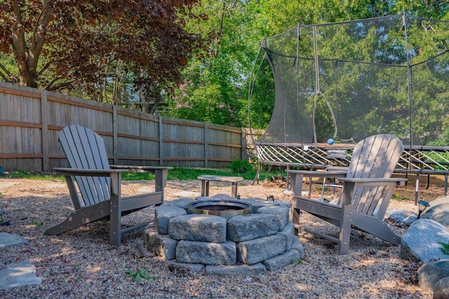 504 Lake St, Mount Horeb, WI 53572 - view of yard with an outdoor fire pit and fence
