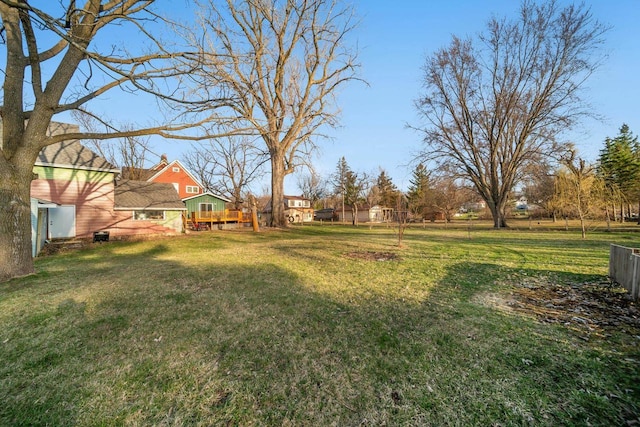 607 Jefferson Ave, Omro, WI 54963 - view of yard featuring a deck