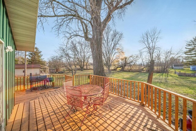 607 Jefferson Ave, Omro, WI 54963 - wooden terrace with a yard and outdoor dining space