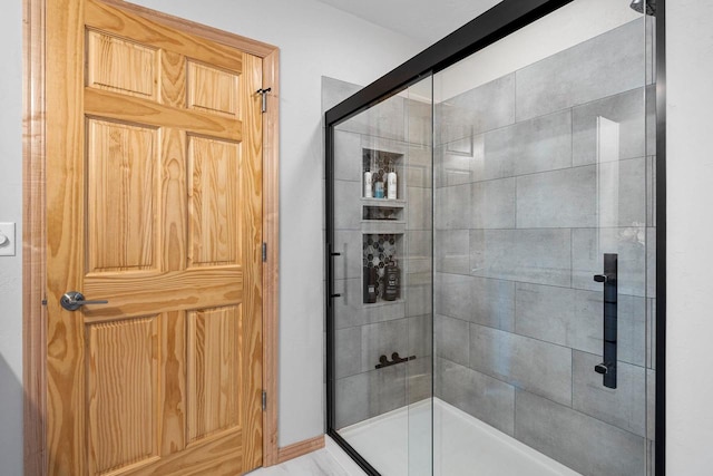 bathroom with a stall shower