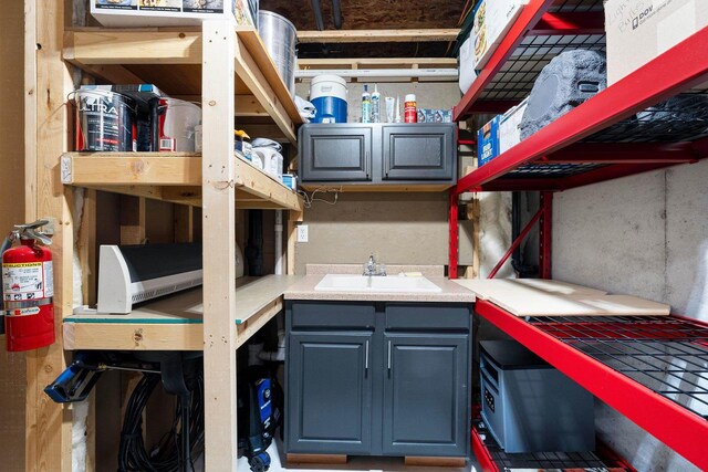 storage room with a sink