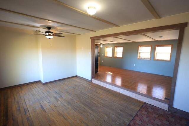50220 Turkey Ridge Rd, Gays Mills, WI 54631 - empty room with hardwood / wood-style flooring, ceiling fan, baseboards, and beamed ceiling