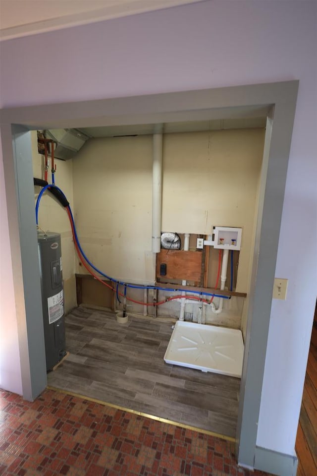 50220 Turkey Ridge Rd, Gays Mills, WI 54631 - washroom featuring water heater, laundry area, and washer hookup