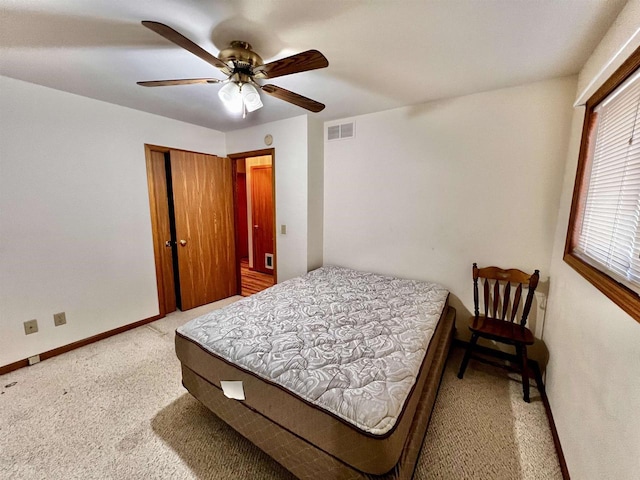 489 Sir Winston Trl, Nekoosa, WI 54457 - carpeted bedroom featuring baseboards, a ceiling fan, and a closet