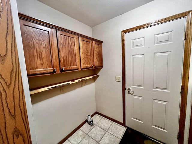 489 Sir Winston Trl, Nekoosa, WI 54457 - laundry room with baseboards