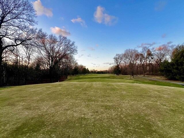 489 Sir Winston Trl, Nekoosa, WI 54457 - view of community with a yard and view of scattered trees