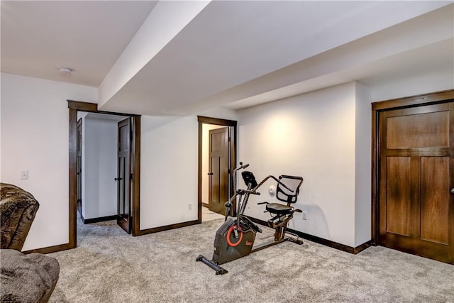6468 Aspen Ridge Dr, Eau Claire, WI 54703 - workout room with baseboards and light colored carpet