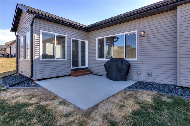 6468 Aspen Ridge Dr, Eau Claire, WI 54703 - rear view of property featuring entry steps and a patio area